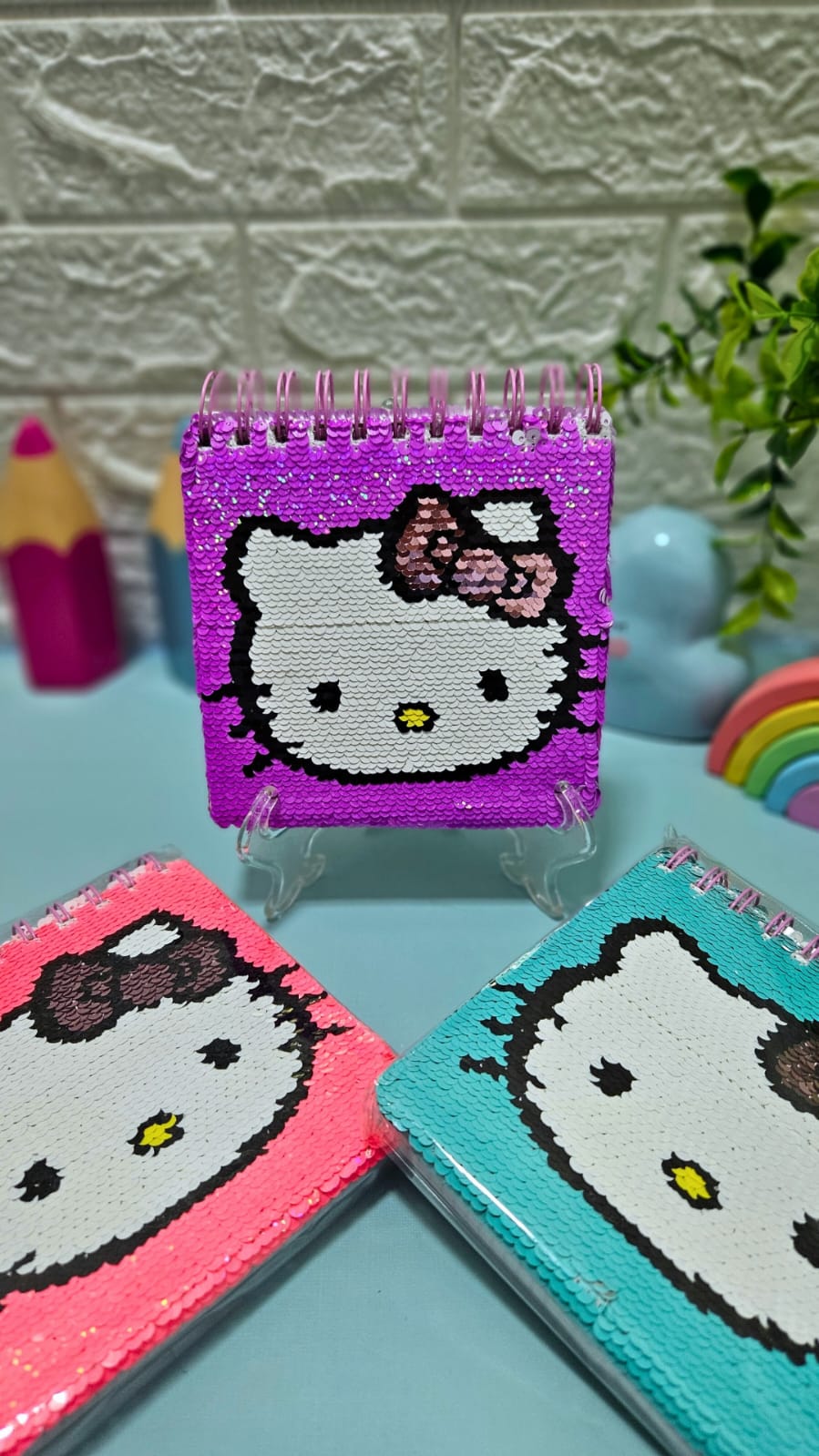 Bloco de anotações com lantejoulas Hello Kitty - Arco Iris